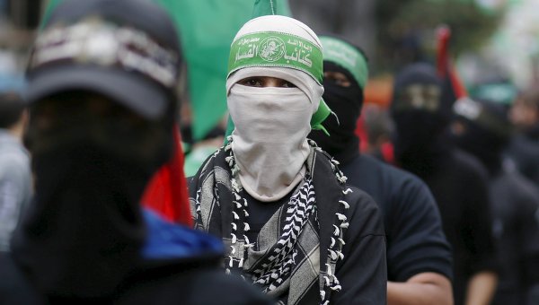 Палестинец в маске ХАМАС. Архивное фото