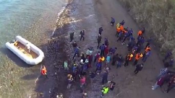 Высадка беженцев из Африки и Ближнего Востока на побережье Греции