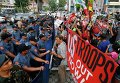 Протестующие выступают против участия войск США в территориальном споре между Китаем и Филиппинами