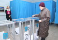 Голосование на выборах. Архивное фото