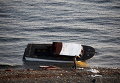 Лодка, на которой беженцы прибыли на греческий остров Лесбос