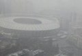 Снегопад в центре Киева. Вид на НСК Олимпийский