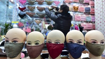 Торговец масок-респираторов в Китае