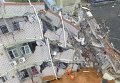 Вид с воздуха. Спасатели ищут выживших в поврежденном здании после оползня в Шэньчжэне, Китай
