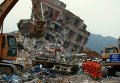 Спасатели на месте обрушения после масштабного оползня в индустриальном парке города Шэньчжэнь в провинции Гуандун на юге Китая