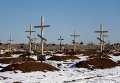 Могилы неизвестных на кладбище в Моспино под Донецком