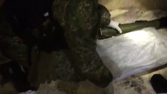 В Луганской области СБУ тайник с боеприпасами в подвале дома. Видео