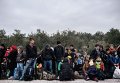 Мигранты в турецкой провинции Чанаккале на пути на греческий остров Лесбос
