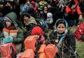 Мигранты в турецкой провинции Чанаккале на пути на греческий остров Лесбос