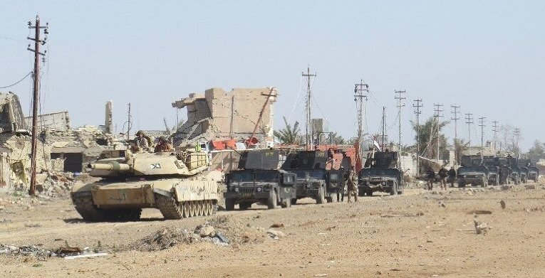 Иракские проправительственные силы зачищают территорию на восточной окраине Эр-Рамади после освобождения от боевиков Исламского государства
