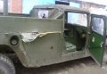 Автомобиль Hummer мобильной группы после обстрела в Луганской области