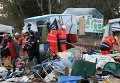 Разбор мигрантского лагеря в Кале, Франция