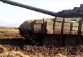 Девушка-контрактник ВСУ проходит обкатку танком. Видео