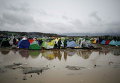 Мигранты в палаточном лагере на греко-македонской границе, недалеко от деревни Идомени, Греция