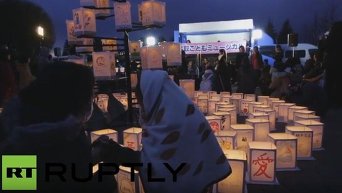 В Японии зажгли cотни фонариков в память о жертвах цунами 2011 года