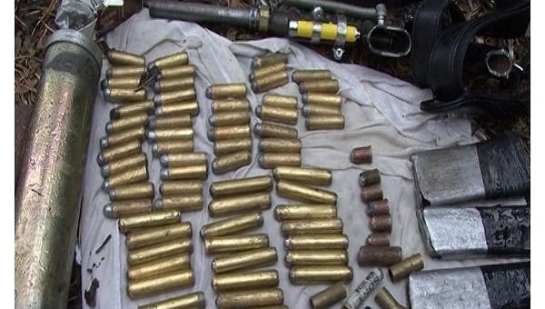 В Киеве коммунальщики обнаружили арсенал оружия в одном из гаражей