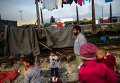 Беженцы с Ближнего Востока на границе Македонии и Греции