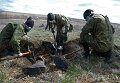 Массовое захоронение бойцов ВСУ обнаружено под Дебальцево