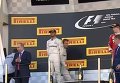 Путин наградил Нико Росберга, победившего на российском этапе Формулы-1. Видео