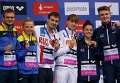 Юлия Прокопчук, вторая слева, и Александр Горшковозов выиграли серебро чемпионата Европы. Наши прыгуны в воду заняли второе место в командных соревнованиях
