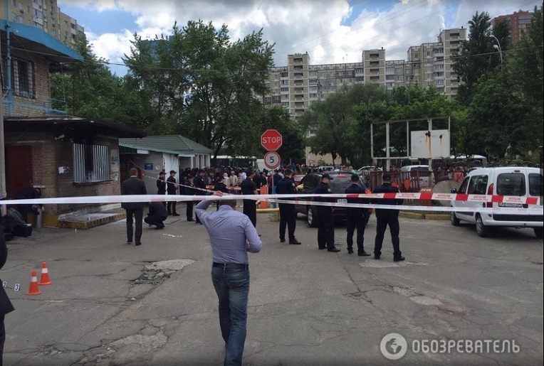 На месте разборок и взрыва на автостоянке в Киеве