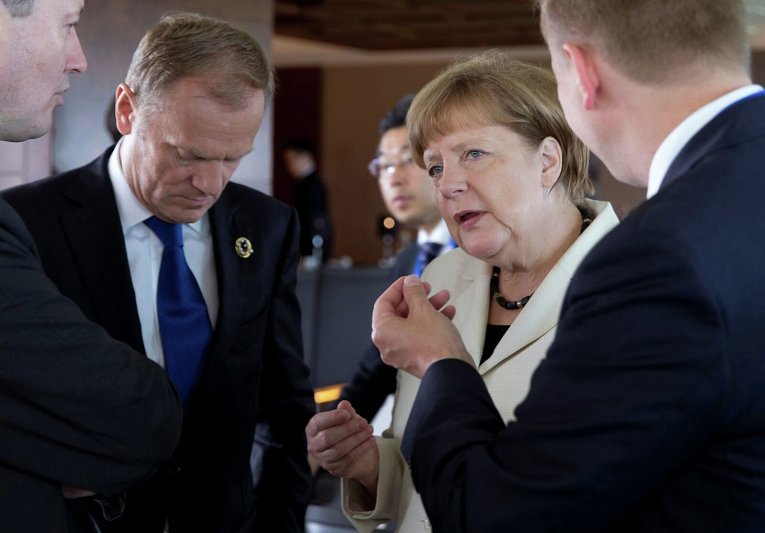 Дональд Туск и Ангела Меркель на саммите G7