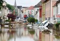 Последствия наводнения в небольшой баварской деревне возле Мюнхена (Германия)
