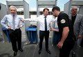 Мэр Ниццы Кристиан Эстрози проходит проверку перед входом на стадион, где будут проходить матчи Евро-2016