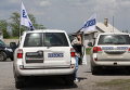 Автомобили представителей Специальной мониторинговой миссии (СММ) ОБСЕ в Донбассе.