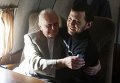Юрий Солошенко и Геннадий Афанасьев в самолете