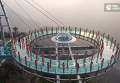 День йоги, или Как китайцы выполняли асаны на высоте 396 метров. Видео