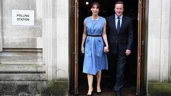 Дэвид Кэмерон с женой Самантой после голосования на референдуме о членстве Великобритании из ЕС