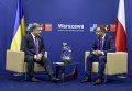 Президент Украины Петр Порошенко (слева) и президент Польши Анджей Дуда во время встречи в рамках саммита НАТО в Варшаве