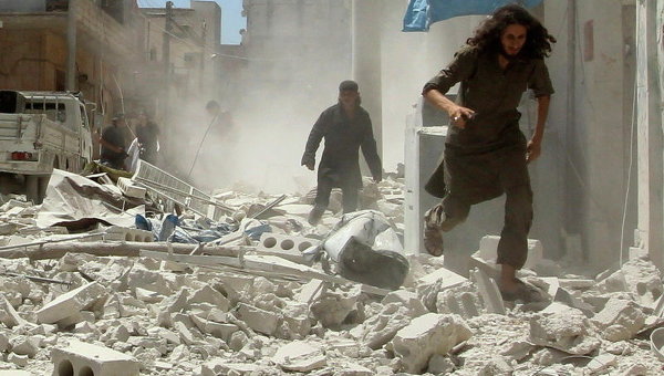 Разрушенные зданий ударами с воздуха в городе Идлиб, Сирия
