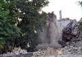 Расчистка завалов на месте обрушения Масонского дома в Одессе