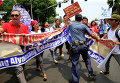 Акция протеста в Филиппинах против визита госсекретаря Джона Керри