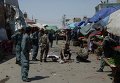 Афганские полицейские на месте теракта