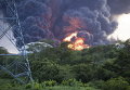 Взрыв, вызванный пожаром в баке для хранения топлива, принадлежем Puma Energy Company в Пуэрто-Сандино, Леон, Никарагуа