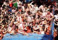 Помидорный фестиваль в Испании Томатина в городке Буньоль провинции Валенсия