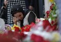 Женщина огорчена смертью Ислама Каримова