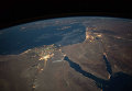 Вид из космоса на ночную Землю
