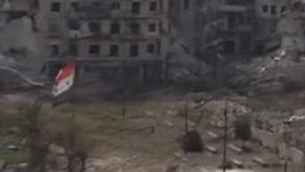 Сирийский флаг поднят над Цитаделью Алеппо. Видео