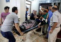 Раненная в результате теракта в Сирии женщина в больнице Аль-Рахма
