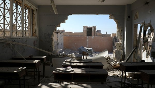 Последствия атаки по школе в Сирии, в результате чего погибли 22 детей