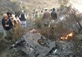 На месте крушения самолета в Пакистане 7 декабря 2016 года