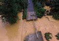 Мост поврежден в результате наводнений в провинции Сурат Тани, южной части Таиланда.