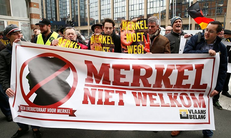 Акция протеста против Меркель в Брюсселе
