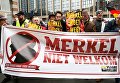 Акция протеста против Меркель в Брюсселе