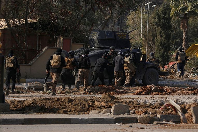 Иракский спецназ штурмует удерживаемый боевиками Исламского государства город Мосул