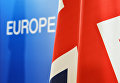 Флаг Великобритании на фоне слова Европа. Архивное фото